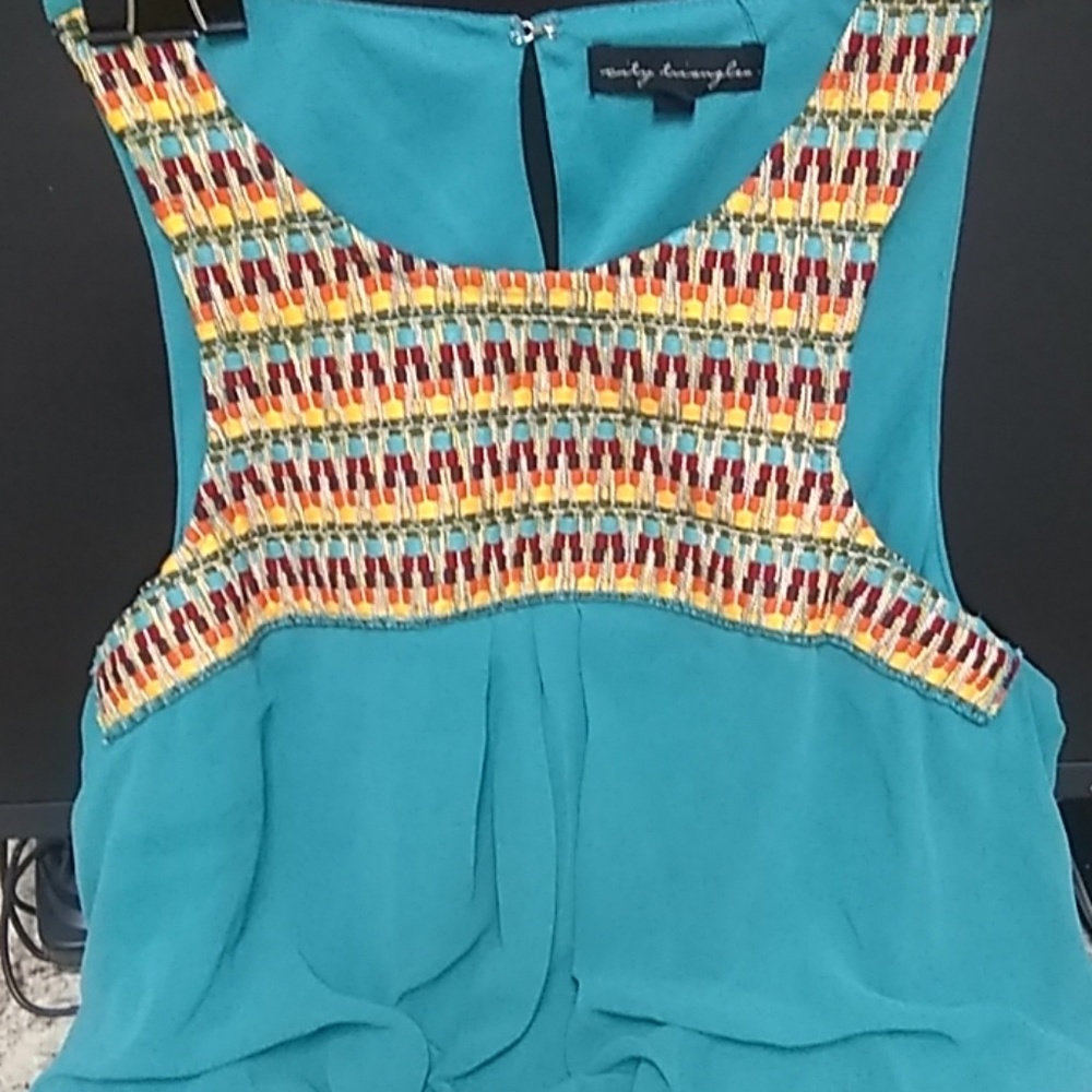 Full length teal dress with embroidery details
